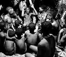 elder telling story to a gathering 