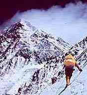 lone climber approaching everest