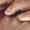 portion of photo of hands, click here to go to essay