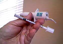 photo of the instaject being held by manny